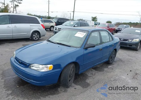 1999 Toyota Corolla Le z USA, uszkodzony, nr VIN 2T1BR12E9XC232710